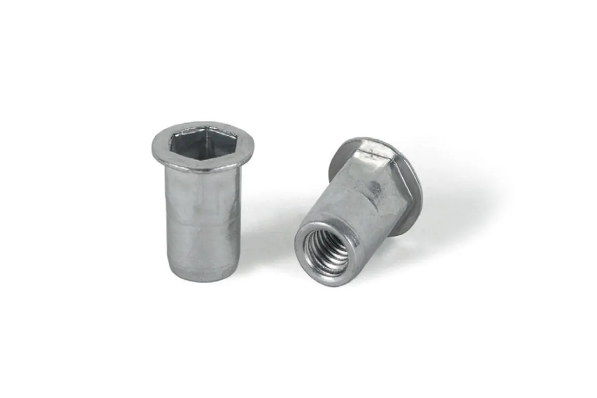 Клепальна гайка цинк з плоским буртиком частково шестигранна відкрита Bralo Клепальна гайка цинк з плоским буртиком частково шестигранна відкрита Bralo